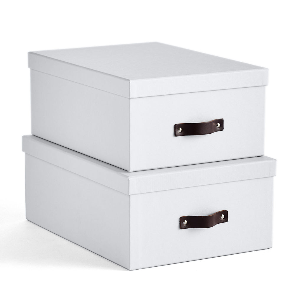 https://www.shop.californiaclosets.com/cdn/shop/products/bleecker-storage-boxes-with-handle-set-of-2-white-silo_1894_MT_1000x1000_65f3b2d0-8c4e-48b7-b458-857a7886c8ec_1080x.jpg?v=1603497068