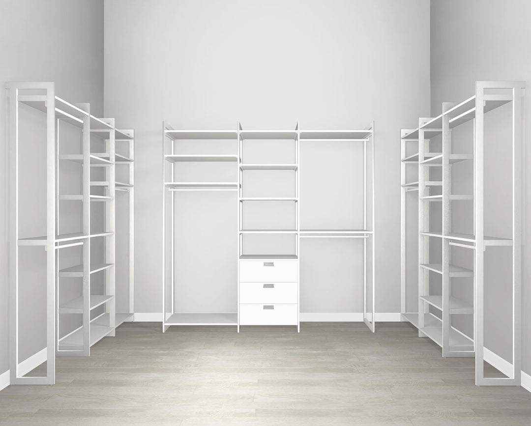 Empty walk in closet of a new home with shelves and metal rods for